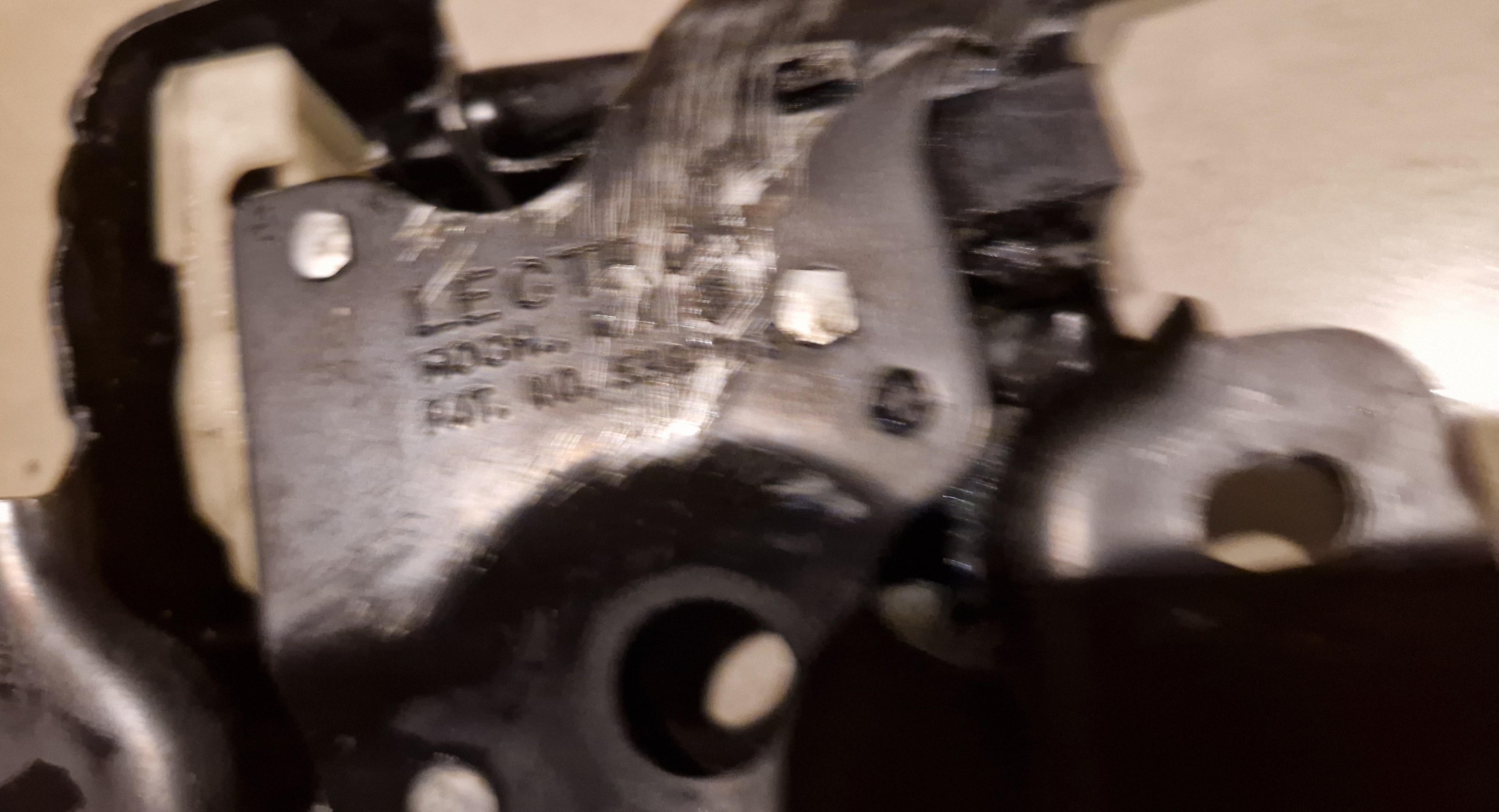 Ontgrendelmechanisme achterklep
